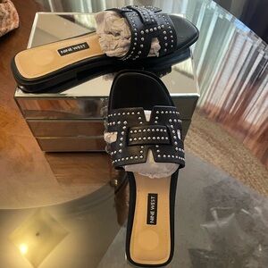 Studded black sandals